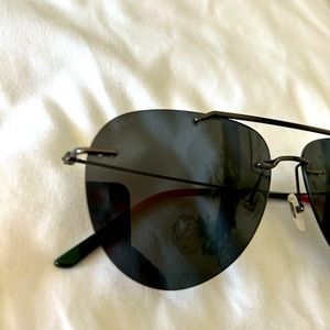 100% authentic Gucci frameless sunglasses.  New without case or tag.  Stylish
